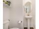 Clean half-bathroom with a pedestal sink, toilet, and modern fixtures at 9031 Odell Corners Nw Blvd, Concord, NC 28027