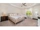 Bright bedroom with natural light, two beds, and comfortable furnishings at 9031 Odell Corners Nw Blvd, Concord, NC 28027