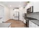 Modern kitchen design with stainless steel appliances and ample counter space for cooking at 9031 Odell Corners Nw Blvd, Concord, NC 28027