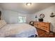 Bedroom with dresser and nautical accents, providing a relaxing space for a peaceful night's sleep at 113 Hidden Ln, Mooresville, NC 28117