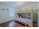 bedroom with bunk bed, creating a fun and functional space for children at 113 Hidden Ln, Mooresville, NC 28117