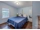 Bedroom featuring serene colors and nautical theme, providing a relaxing and restful retreat at 113 Hidden Ln, Mooresville, NC 28117
