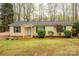 Charming single-story home featuring a well-maintained lawn and inviting entrance at 113 Hidden Ln, Mooresville, NC 28117