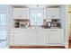 Clean, bright kitchen featuring white cabinets, stainless sink, and modern appliances at 113 Hidden Ln, Mooresville, NC 28117