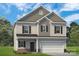 Charming two-story home featuring a classic design, landscaped yard, and a two-car garage at 1234 Wendall Ln, Mount Pleasant, NC 28025