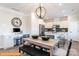 Open-concept kitchen featuring an island, stainless steel appliances, and a dining area at 1234 Wendall Ln, Mount Pleasant, NC 28025