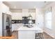 Modern kitchen with stainless steel appliances, a center island, and ample white cabinetry at 1234 Wendall Ln, Mount Pleasant, NC 28025