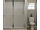 Elegant bathroom showcasing a sleek glass shower, modern toilet, and a serene, well-lit ambiance at 135 Wheeler Trl, Statesville, NC 28625