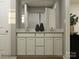 Modern bathroom showcasing a double vanity, sleek fixtures, and contemporary design for a spa-like experience at 135 Wheeler Trl, Statesville, NC 28625