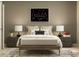 Inviting bedroom with sports decor, comfortable bed, decorative pillows, and soft lighting at 135 Wheeler Trl, Statesville, NC 28625