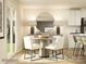 Cozy breakfast nook with a round table, white chairs, and views of the kitchen at 135 Wheeler Trl, Statesville, NC 28625