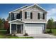 Charming two-story home with a two-car garage and beautifully designed facade at 154 Bellina Dr # 59, York, SC 29745
