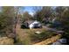 Aerial view of the home nestled among bare trees, showcasing its location at 1545 7Th Avenue Sw Dr, Hickory, NC 28602