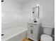 Modern bathroom featuring a tub, vanity with modern fixtures, and a toilet at 1545 7Th Avenue Sw Dr, Hickory, NC 28602