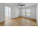 Bedroom with a closet and a window, featuring wooden floors and white walls at 1545 7Th Avenue Sw Dr, Hickory, NC 28602