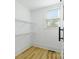 Walk-in closet with metal shelves and a window at 1545 7Th Avenue Sw Dr, Hickory, NC 28602