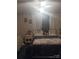 Cozy bedroom featuring a bed with plush blankets and a decorative wallpaper at 160 17Th Street Nw Pl # 3E, Hickory, NC 28601