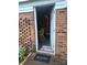 Charming front door with unique brickwork and a welcoming mat at 160 17Th Street Nw Pl # 3E, Hickory, NC 28601