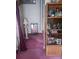 Hallway with plush carpeting, decorative furniture, and built-in shelving at 160 17Th Street Nw Pl # 3E, Hickory, NC 28601