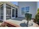 Outdoor patio features a screened area and a built-in grill, perfect for outdoor dining at 16524 Palisades Commons Dr, Charlotte, NC 28278