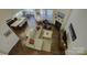 Bright living room with dark hardwood floors and fireplace at 16524 Palisades Commons Dr, Charlotte, NC 28278