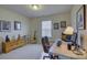 Office with desk and chair next to window and decorated with artwork at 16524 Palisades Commons Dr, Charlotte, NC 28278