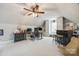 This bonus room features a built in bar, office space, carpet flooring and neutral paint at 2095 Westridge Dr, Rock Hill, SC 29732