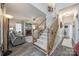 Inviting living area with a fireplace, neutral tones, and a staircase, creating a warm and spacious atmosphere at 2095 Westridge Dr, Rock Hill, SC 29732
