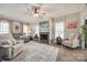 Bright living room featuring a fireplace, comfortable seating, and natural light, perfect for relaxation and gatherings at 2095 Westridge Dr, Rock Hill, SC 29732