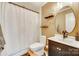 Bathroom with bronze fixtures, decorative shelving, and a toilet with a wooden step stool at 2175 Highwood Rd, Rock Hill, SC 29732