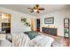 Bright bedroom featuring hardwood floors, an area rug, and access to the en-suite bathroom at 2175 Highwood Rd, Rock Hill, SC 29732