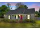 Charming home with a welcoming porch, vibrant landscaping, and a freshly painted exterior, creating an inviting curb appeal at 2175 Highwood Rd, Rock Hill, SC 29732