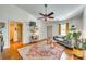 Open living room design showcases wood floors, modern decor, and plenty of natural light from the window at 2175 Highwood Rd, Rock Hill, SC 29732