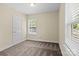 Bedroom with window and neutral carpet at 2325 Sanders Ave, Charlotte, NC 28216