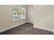 Bedroom with neutral carpet and a bright window at 2325 Sanders Ave, Charlotte, NC 28216