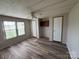 Bedroom with wood-look flooring and natural light coming in from the windows at 236 Bowmans Cutover Rd, Taylorsville, NC 28681