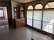 Dining room features natural light from windows, built-in cabinet and view to the rest of the home at 236 Bowmans Cutover Rd, Taylorsville, NC 28681