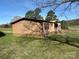 Charming single-story home featuring a brick foundation and metal roof on a grassy lot at 236 Bowmans Cutover Rd, Taylorsville, NC 28681