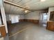 Spacious living room with wood-look flooring, and view to the rest of the home at 236 Bowmans Cutover Rd, Taylorsville, NC 28681