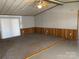 Spacious living room with wood-look flooring, ceiling fan and view to the rest of the home at 236 Bowmans Cutover Rd, Taylorsville, NC 28681