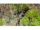 Aerial view of a home nestled among lush trees and greenery at 245 Clontz Hill Rd, Troutman, NC 28166