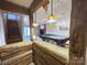 Finished basement with a rustic bar, a pool table and a brick fireplace at 245 Clontz Hill Rd, Troutman, NC 28166