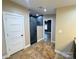 This bathroom leads to a spacious glass shower with an entrance to the primary bedroom at 245 Clontz Hill Rd, Troutman, NC 28166