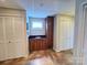 Bathroom with tiled floor, sink, vanity, window, cabinets and storage at 245 Clontz Hill Rd, Troutman, NC 28166