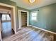 Cozy bedroom with hardwood floors, closet, and a serene atmosphere for restful nights at 245 Clontz Hill Rd, Troutman, NC 28166