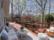 Inviting deck with comfortable seating and a gazebo surrounded by lush greenery at 245 Clontz Hill Rd, Troutman, NC 28166