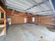 Garage interior view features shelving, storage cabinets and a door with a window at 245 Clontz Hill Rd, Troutman, NC 28166