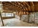Open attic space featuring exposed beams and insulation, ready for renovation and new possibilities at 2705 Robinson Rd, Newton, NC 28658