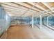 Unfinished basement featuring concrete walls and exposed wooden ceiling beams at 2705 Robinson Rd, Newton, NC 28658