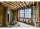 Unfinished bedroom shows the window view and ceiling beams at 2705 Robinson Rd, Newton, NC 28658